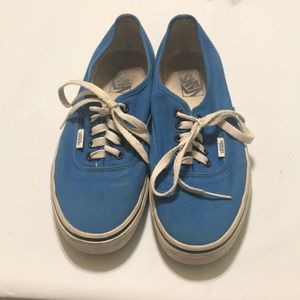 Blue and white vans sneakers